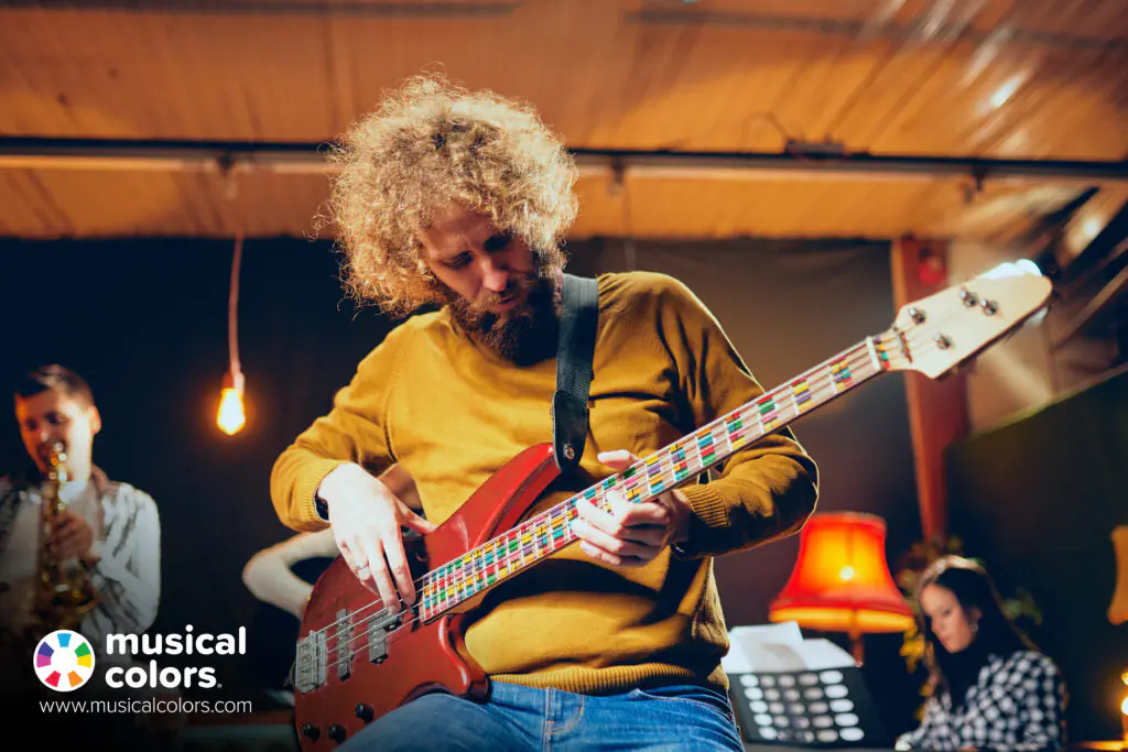 Musician using Musical Colors® color-coded music theory on guitar
